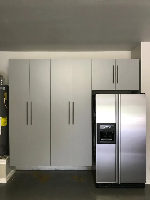 Silver with silver handles over the fridge image